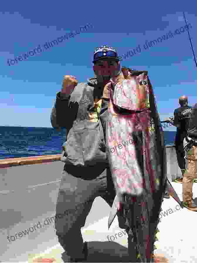 A Triumphant Angler Holding A Large Fish, Symbolizing The Rewards Of Successful Fishing The Complete Fishing Manual: Tackle * Baits Lures * Species * Techniques * Where To Fish